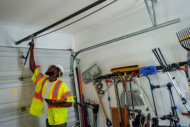 Professional Garage Door Panel Replacement technician working in Progress, PA